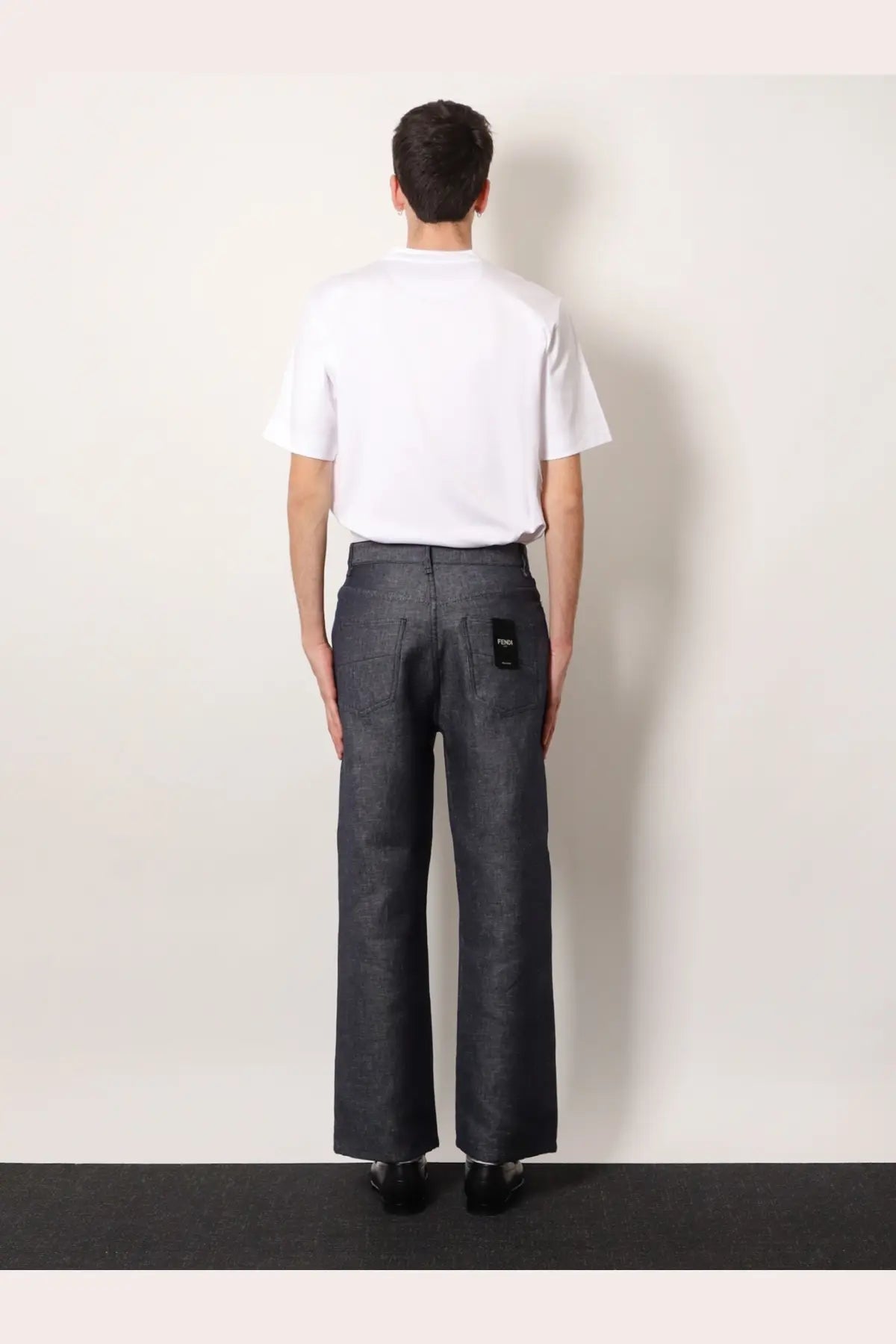 Fendi men’s dark gray wide-leg denim trousers with cotton and silk blend featuring minimalist design and subtle stitching