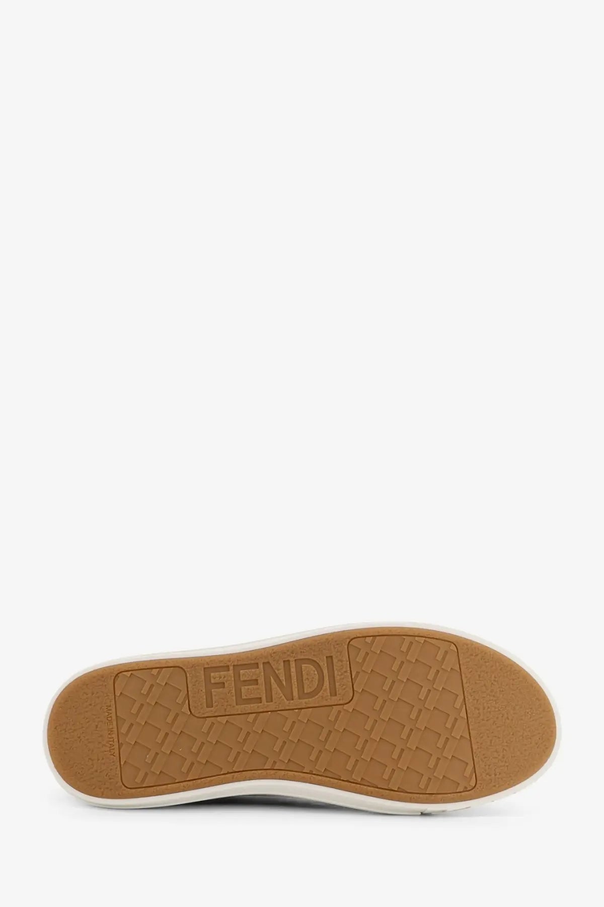 Tan rubber sole with embossed fendi logo and textured pattern on fendi men’s fendi domino ff jacquard fabric sneakers black
