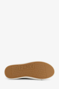 Tan rubber sole with embossed fendi logo and textured pattern on fendi men’s fendi domino ff jacquard fabric sneakers black