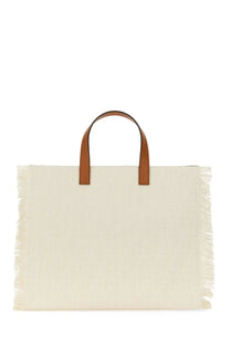 Fendi men’s multicolor ff jacquard bag with cream canvas, tan leather handles, and frayed edges tote bag
