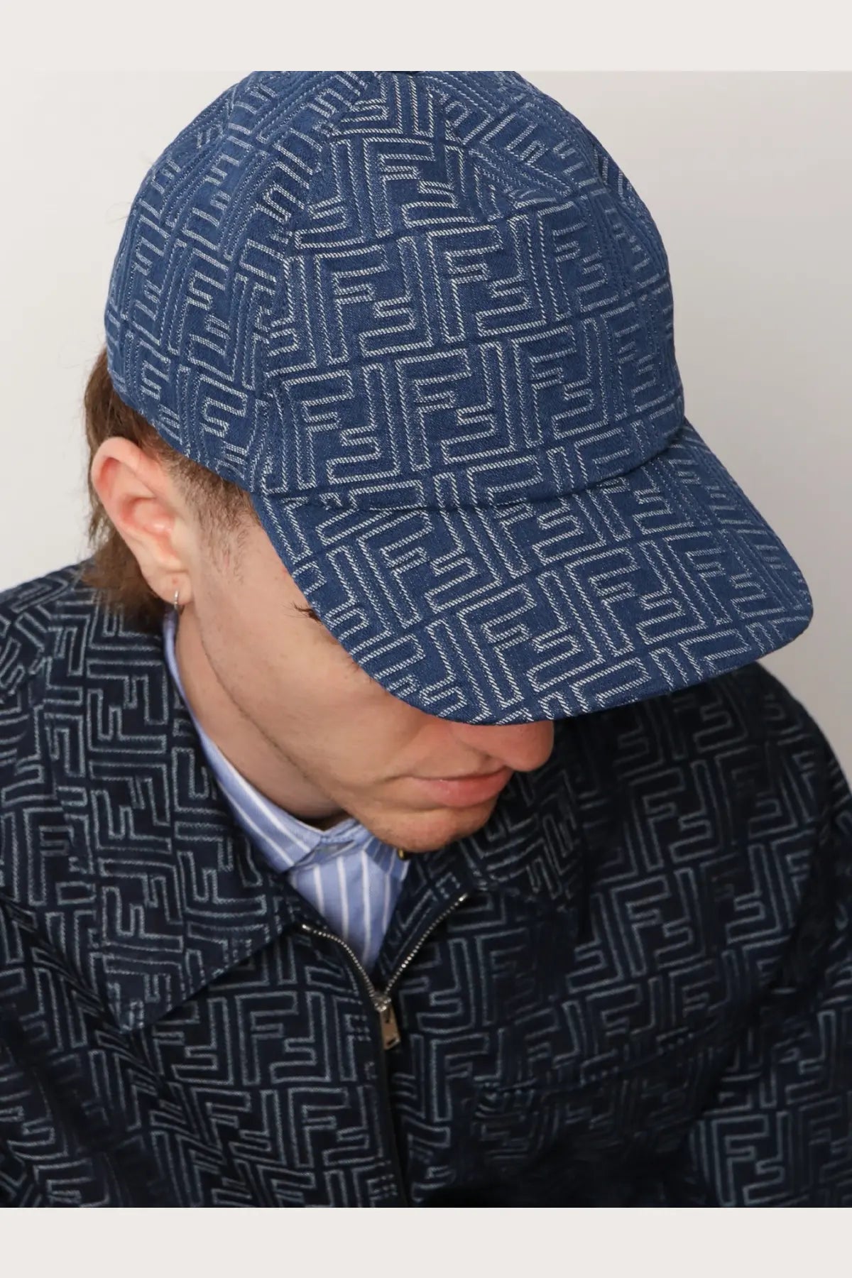Fendi men’s ff jacquard denim baseball hat in blue featuring a repeating white fendi logo pattern
