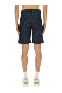 Fendi men’s blue ff jacquard denim shorts with a tailored fit and repeating lighter navy geometric pattern