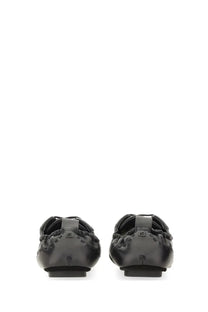Black leather ballet flats with sleek minimalist design and subtle branding on the heel back side