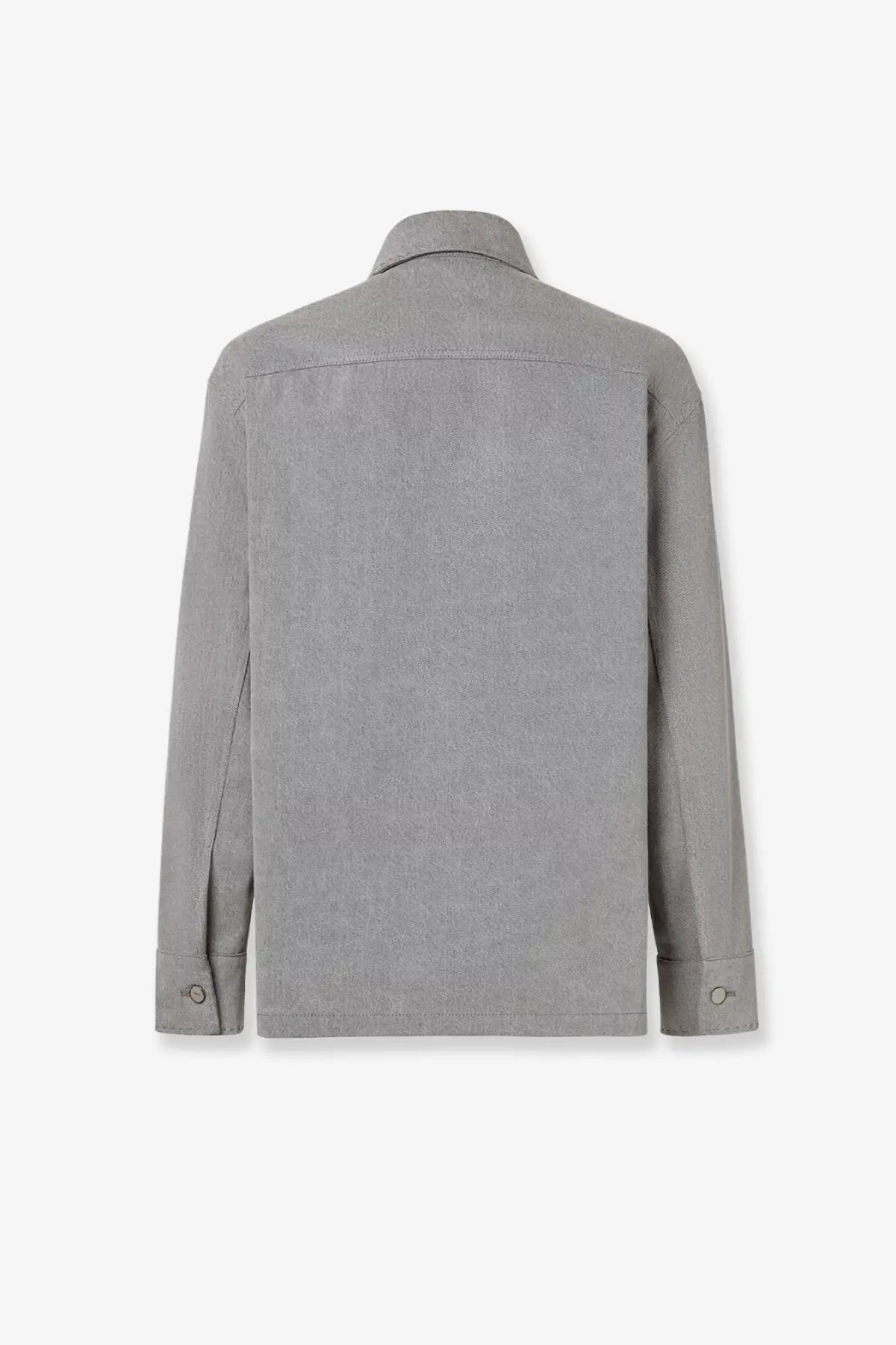 Fendi men’s denim stone bleached grey jacket shown with a gray textured cotton shirt with classic collar and buttoned cuffs