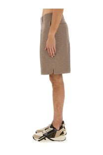 Beige textured Fendi men’s jacquard bermuda shorts with subtle pattern and side slit