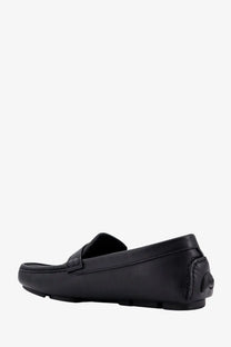 Fendi men’s black leather and canvas loafers with sleek minimalist design and subtle stitching details