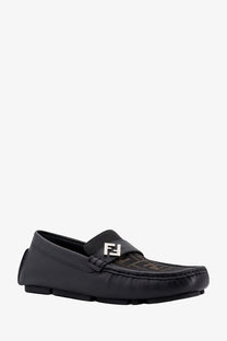 Black Fendi men’s leather and canvas loafers featuring a tonal monogram pattern and signature FF logo plaque