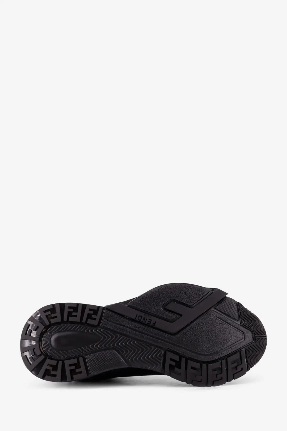 Black rubber sole with repeating fendi logo pattern and embossed brand name on fendi men’s leather flow sneakers black