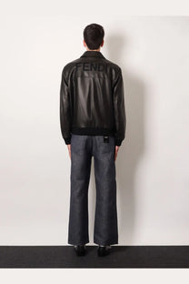 Back side of a black leather fendi men’s bomber jacket with embossed logo on the back