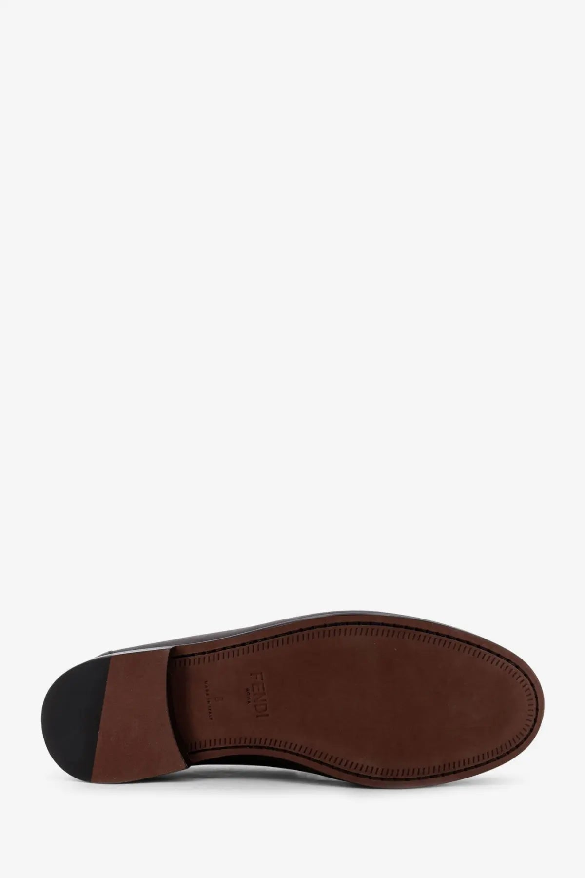 Brown leather fendi men’s leather loafer sole with black rubber heel and stitched edge visible from the back side