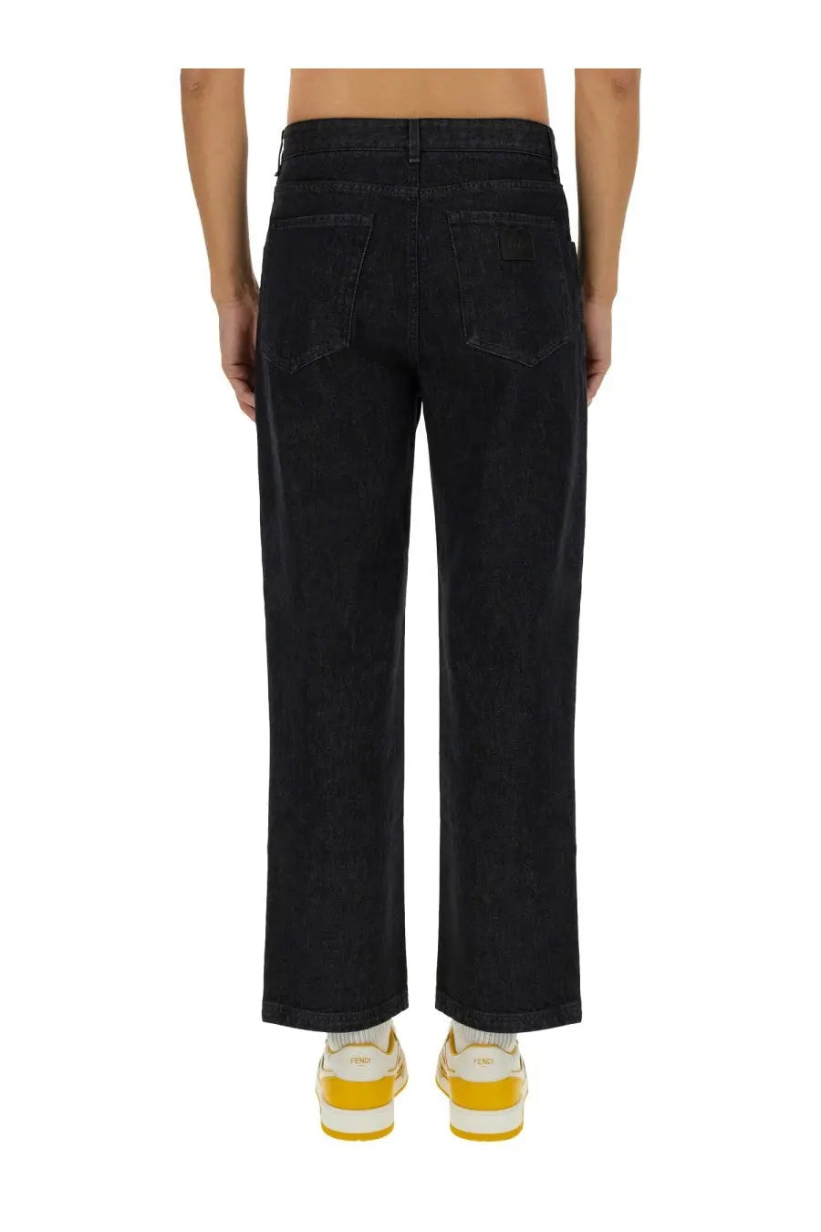 Fendi men’s long jeans black showing the back side with dark-wash denim straight-leg cut and classic back pockets