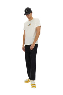 White fendi t-shirt with chest logo paired with black fendi men’s long jeans made of denim