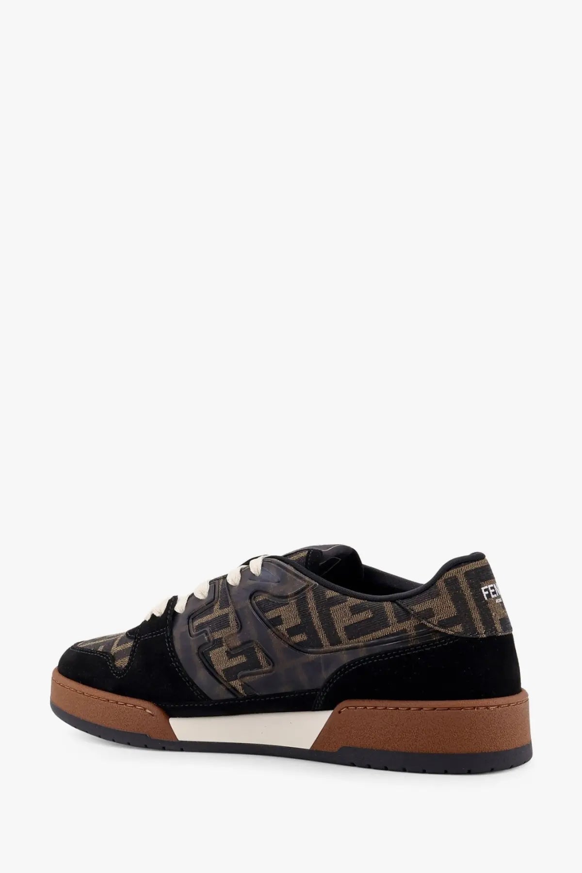 Black and brown Fendi men’s sneakers with monogram jacquard fabric, suede accents, and tan rubber soles