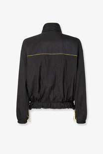 Back side of fendi men’s reversible black nylon jacket with gold trim along the back seam and cuffs
