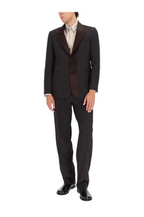 Fendi men’s single breasted tailored jacket in black with dark brown satin lapels worn over beige dress shirt