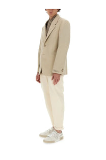 Fendi men’s beige wool double-breasted blazer with subtle texture and matching button details