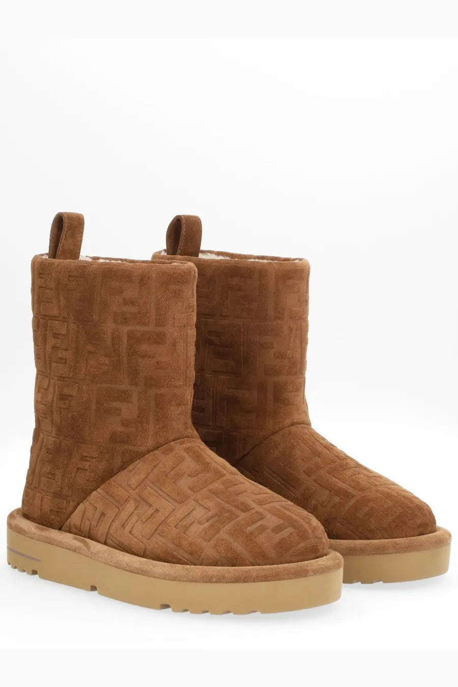 Fendi women’s apres chic boot brown tan suede ugg style with embossed logo pattern across the upper