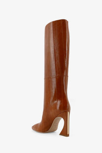 Fendi women’s beige patent leather knee-high boot with a sleek glossy finish and distinctive angular heel