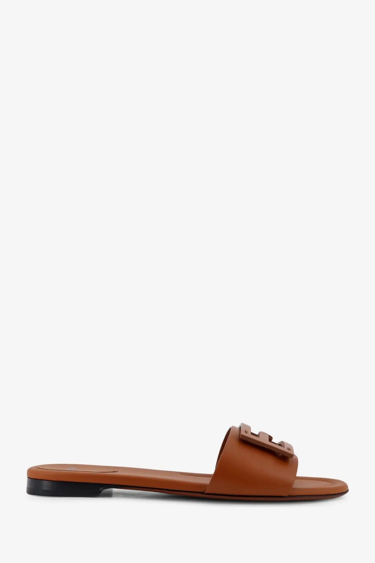 Fendi women’s beige leather slide sandal with rectangular buckle featuring the brand’s logo