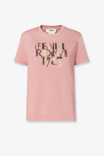 Fendi women’s soft pink cotton t-shirt with bold multicolored graphic print and fendi roma 1925 in black and gold