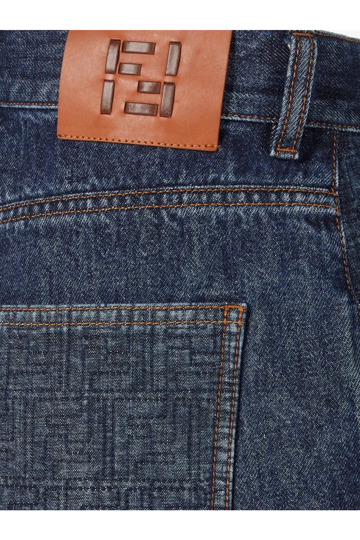 Dark blue denim shorts for women featuring a tan leather patch embossed with the fendi logo on the back side