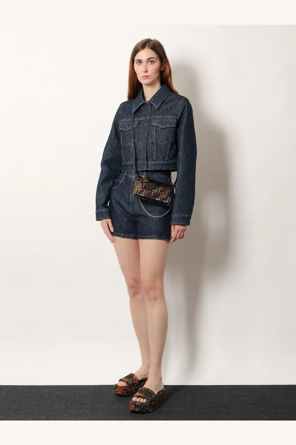 Fendi women’s denim shorts blue paired with fendi logo-patterned mini crossbody bag with chain strap in brown