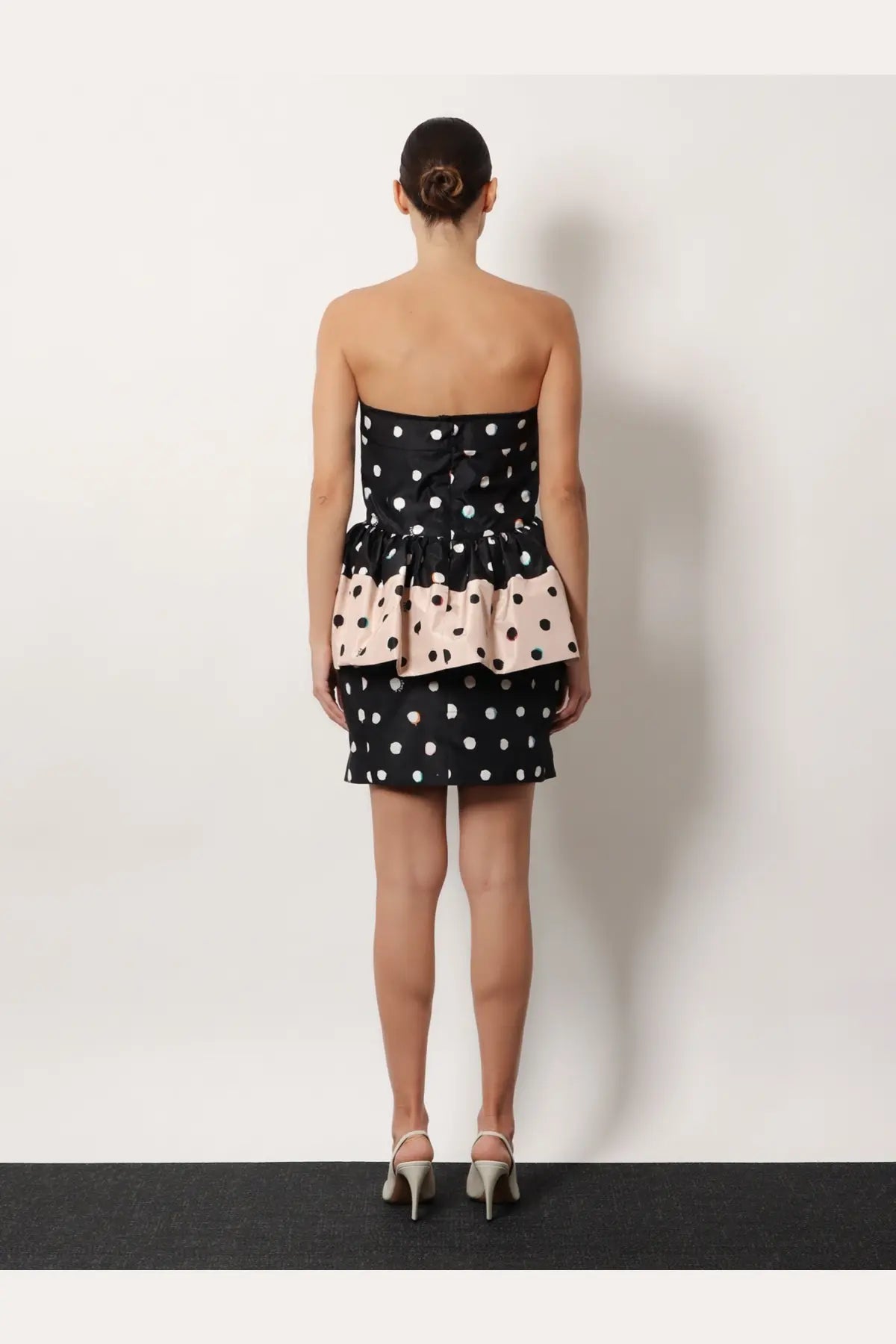 Fendi women’s black and white polka dot strapless taffeta bustier mini dress with soft pink ruffled peplum hem