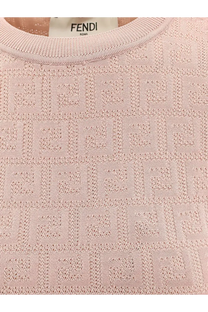 A soft pink fendi sweater with an intricate repeating ff logo pattern woven into cotton and viscose knit fabric