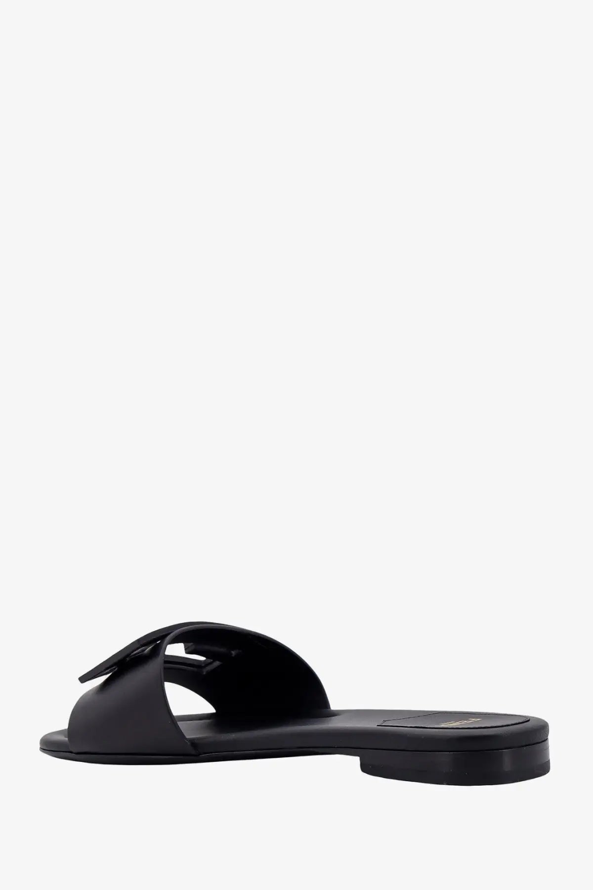 Fendi women’s black leather slide sandal with sleek minimalist design and small logo on the heel back side view