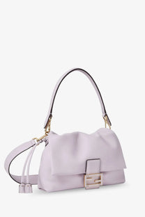 A pale lavender fendi womens mamma baguette medium leather crossbody bag with structured puffy body and gold hardware