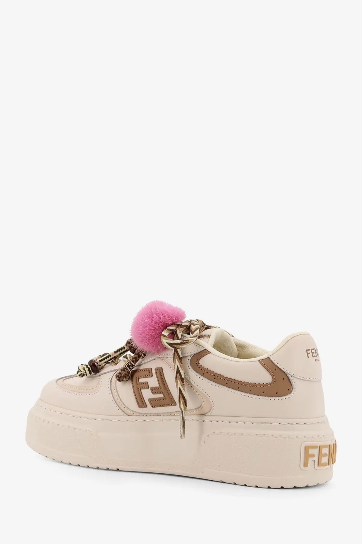 Fendi women’s beige leather platform sneaker with brown accents gold branding and pink fuzzy pom-pom on laces