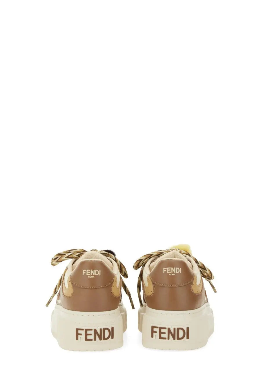 Fendi women’s beige match sneaker with tan braided laces and white rubber sole for casual wear