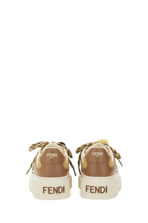 Fendi women’s beige match sneaker with tan braided laces and white rubber sole for casual wear