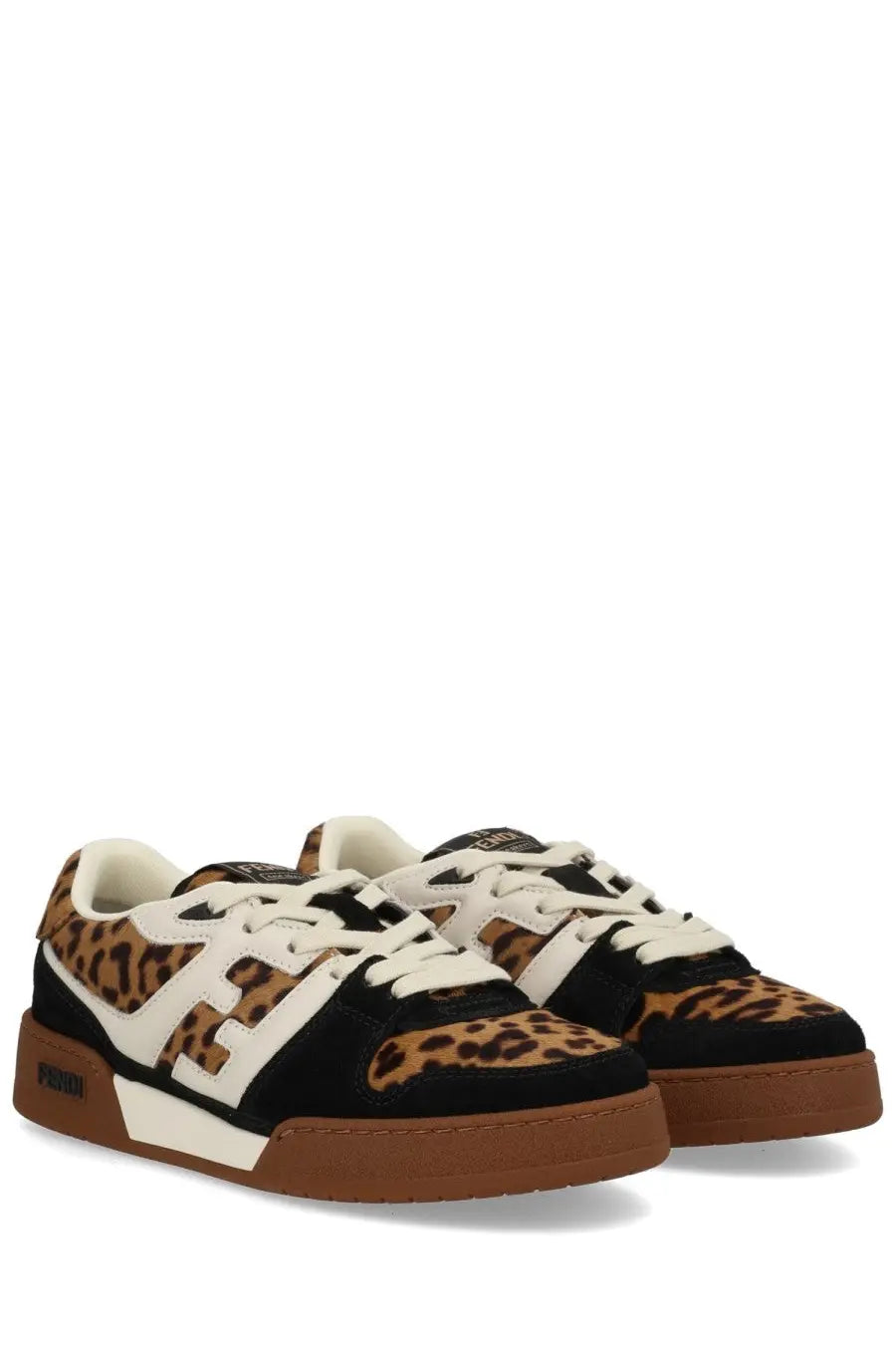 Fendi women’s match sneaker featuring black and tan leopard print with white accents and chunky brown rubber sole
