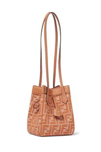 Tan fendi bucket bag in lighter tan and beige with ff logo pattern leather handles and trim for women