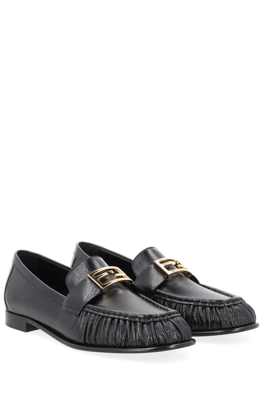 Black leather loafers for women by fendi with gold-tone f-logo buckles and frayed textured toe detail