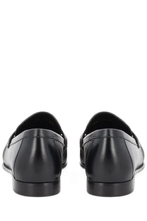 Fendi women’s moccasin baguette black leather loafers with sleek polished finish and classic slip-on design