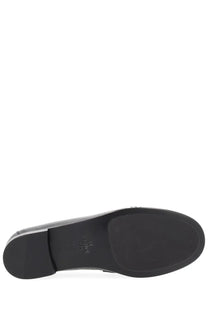 Black leather sole of fendi womens moccasin baguette with smooth glossy finish and embossed branding near heel