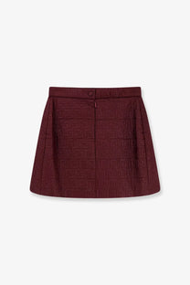 Burgundy Fendi women’s mini skirt in textured fabric with repeating FF logo pattern in quilted nylon material
