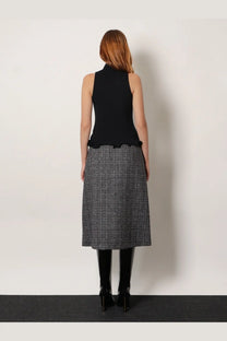 Fendi women’s black ribbed virgin wool sleeveless top with high neckline and ruffled hem front view