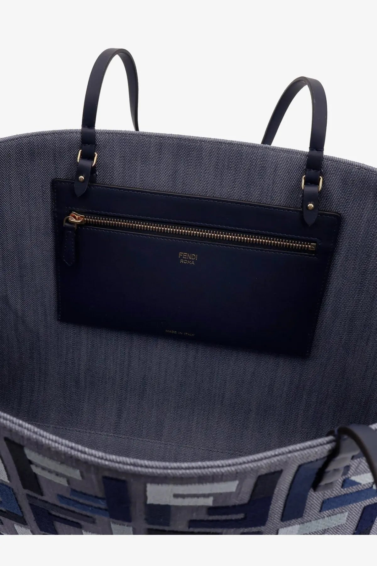 Denim blue Fendi women’s roll large jacquard FF fabric tote bag with black leather handles and front zippered pocket