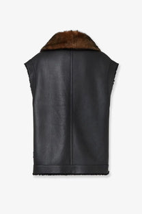 Fendi women’s sleeveless sheepskin jacket black leather vest with brown fur collar and frayed edges front view