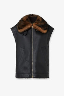 Fendi women’s black leather sleeveless vest with plush brown fur collar and two front pockets sheepskin jacket