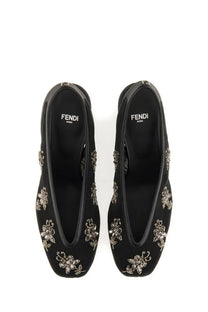 Fendi women’s slingback black leather loafers with sparkling silver floral embroidery on the front
