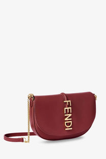 Burgundy Fendi wallet on chain leather crossbody bag with gold-tone logo and chain strap for women in red