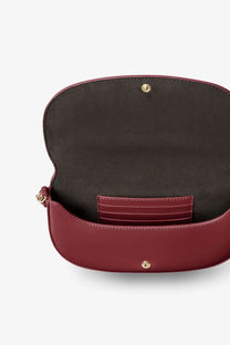 Fendi women’s wallet on chain crossbody bag in burgundy leather with minimalist design and gold tone hardware