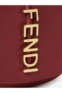 A burgundy fendi wallet on chain fendigraphy leather crossbody bag with gold-tone lettering in red