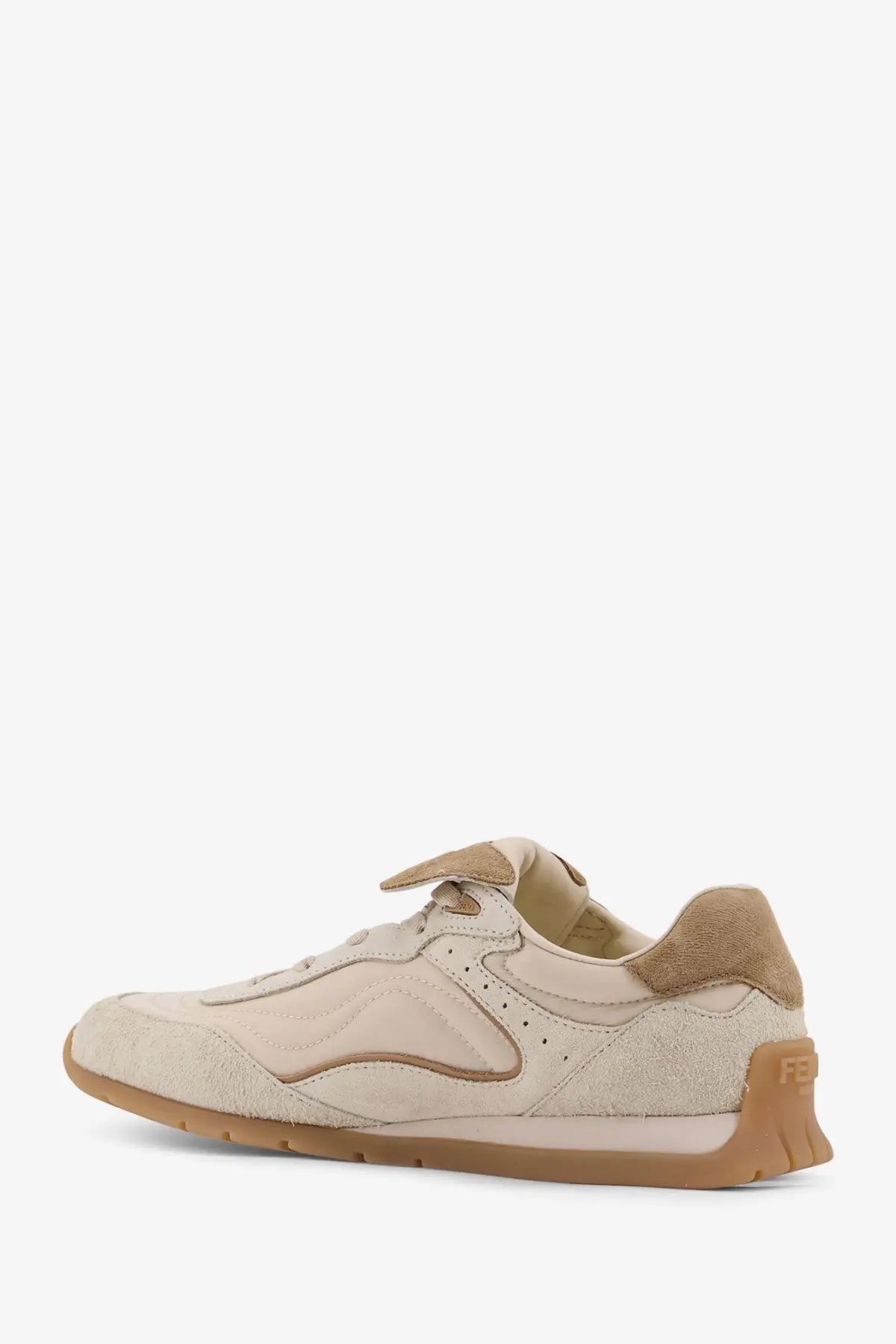 Beige suede and tan leather women’s low-top sneaker with chunky rubber sole from Fendi Wave Pulse collection