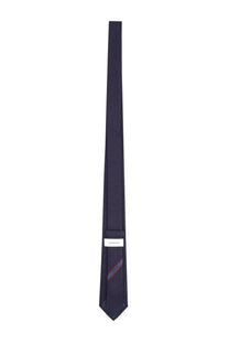 Ferragamo men’s cravatta in seta blue navy silk tie with subtle diagonal stripe pattern near the tip