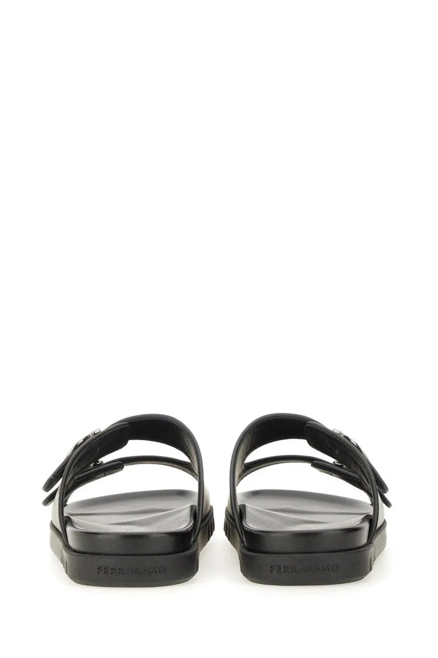 Ferragamo men’s black leather slide sandals with chunky sole and dual-strap design